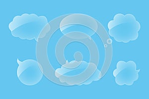 Glass speech bubbles isolated on a blue background.