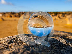 Glass Sphere with Pinnacles desert Australia