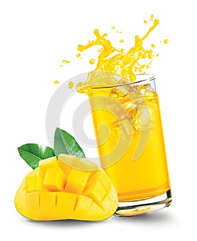 Glass of splashing mango juice with mango fruit on white background