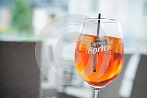 Glass of spritz on restaurant terrace