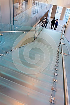 Glass staircase in a modern office interior