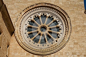 Glass and stone rosette front view in a monsatery.