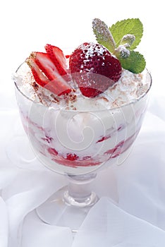Glass with strawberry dessert