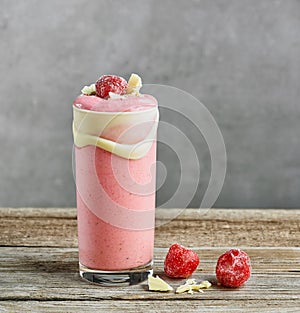 Glass of strawberry milkshake