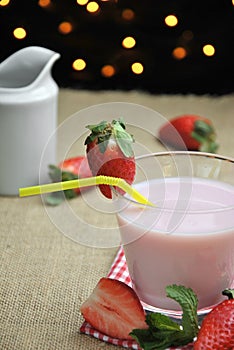 Glass of strawberry milkshake