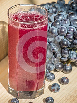 Glass of stum and grapes