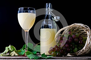 Glass of stum and grapes