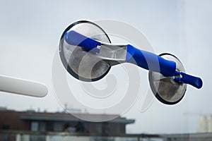 Glass suction cup attached to the glass, Glazier work tool