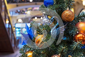 Glass swan figurine on Christmas tree. New Year concept.