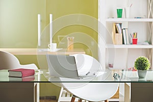 Glass table with laptop