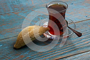 Glass of tea with Azerbaijan pastry shekerbura