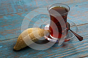Glass of tea with Azerbaijan pastry shekerbura