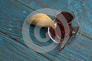 Glass of tea with Azerbaijan pastry shekerbura