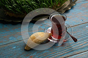 Glass of tea with Azerbaijan pastry shekerbura