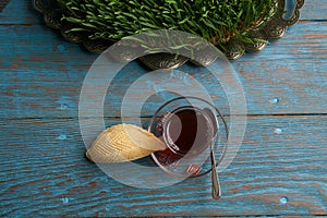 Glass of tea with Azerbaijan pastry shekerbura