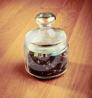 Glass tea pot on wooden table