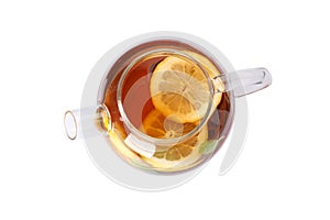 Glass teapot with lemon slices isolated on white