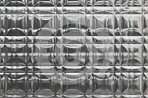 Glass texture square pattern as a background. Abstract gray corrugated backdrop for copy space