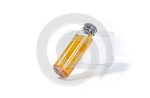 Glass transparent bottle with liquid medicine.