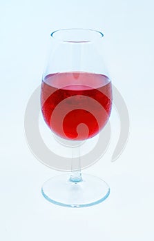 A Glass Transparent Goblet Of Red Wine On A White Background