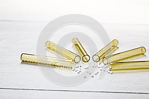 Glass tubes with homeopathy globules