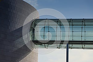 Glass tunnel bridge in a modern building