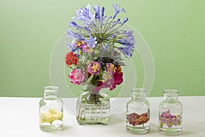 Glass vase with assorted flowers