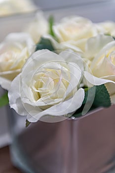 Glass Vase of Cream Silk Roses