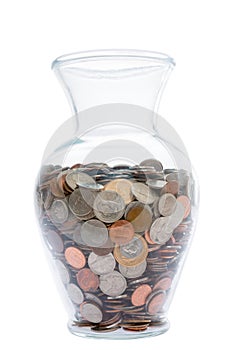 Glass vase filled with coins photo