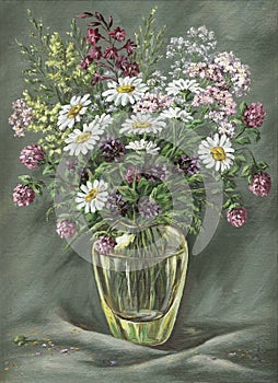 Glass vase with wild flowers