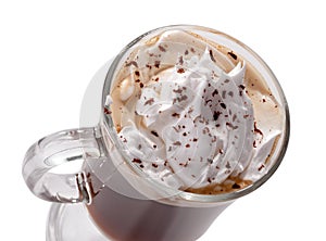 Glass of Viennese coffee top view close-up with whipped cream