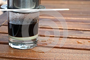 A glass of vietnamese coffee.
