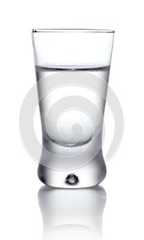 Glass of vodka isolated on white