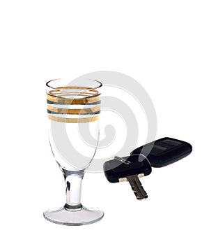 Glass of vodka and keys to car