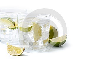 Glass of vodka tonic cocktail isolated on white background