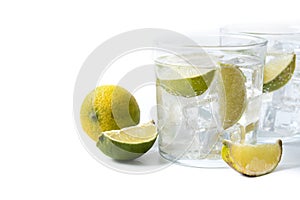 Glass of vodka tonic cocktail isolated on white background