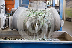 Glass waste in recycling facility. Glass particles photo