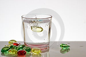 A glass of water with bubbles and splashes