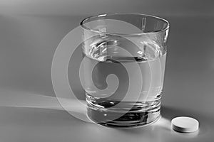 Glass of water and an effervescent pill
