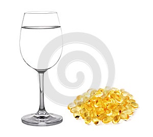 Glass of water and fish oil