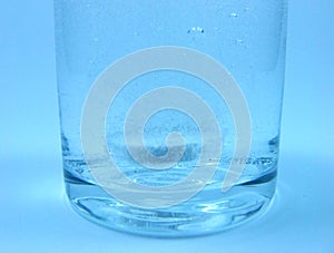 Glass of water with fizzy tablet