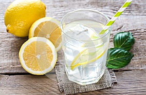 Glass of water with fresh lemon juice