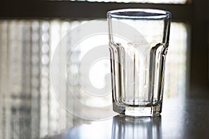 Glass of water in the kitchen photo