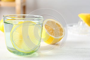 Glass of water with lemon slice