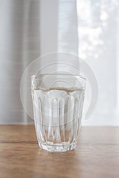 Glass of water placed on the table can be used for decoration.