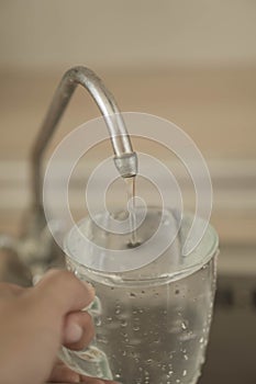 A glass of water poured out of the kitchen.