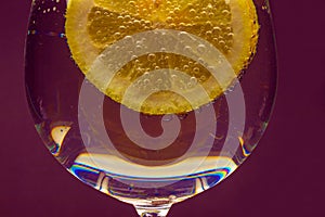 Glass of water with a slice of lemon