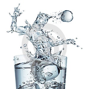 Glass of water with splash as a soccer player