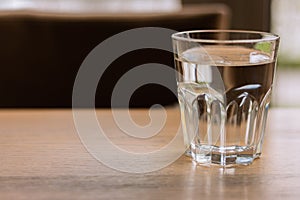 Glass of water on table. Clean water. Purity background. Cold drinks. Healthy lifestyles. Clean beverage. Healthy nutrition.