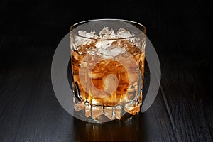 Glass of whiskey with crushed ice